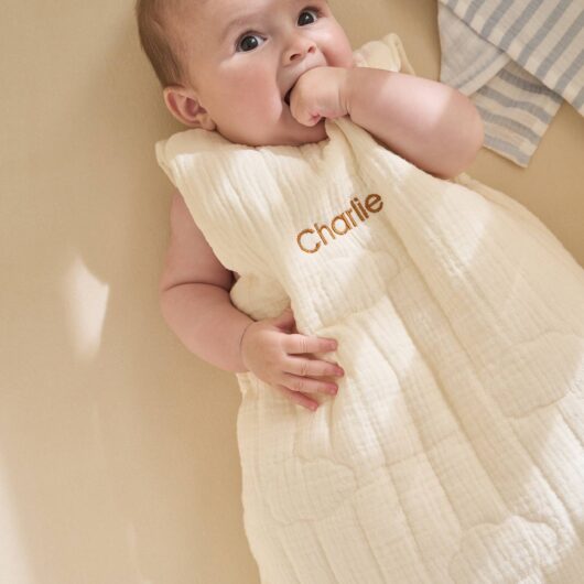 Customisable organic muslin sleeveless baby sleeping bag IN THE CLOUDS ecru